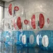 Acht aufgeblasene, neue Bubble Soccer Bälle, die individuell für das Landratsamt Schweinfurt hergestellt und produziert wurden.