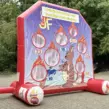 Aufgeblasenes Fußball Darts Modul mit riesiger Torwand aus PVC und vielen Löchern, was individuell für die KJF Lüneburg hergestellt wurden.
