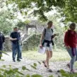 Menschen auf Firmenfeier mit der Eventagentur "Deine Erlebnismacher" während des Teambuilding-Event Schnitzeljagd in Essen.